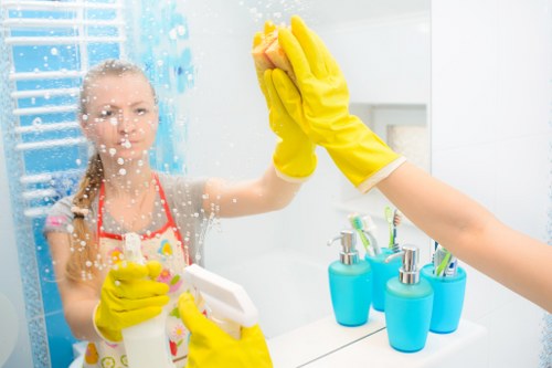 Deep cleaning kitchen and bathroom areas in NW11